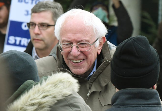 U.S. Senator Bernie Sanders shakes hands with attendees after speaking at a rally for striking Kellogg's workers at Farmers Market Square in Battle Creek, Michigan on December 17, 2021.