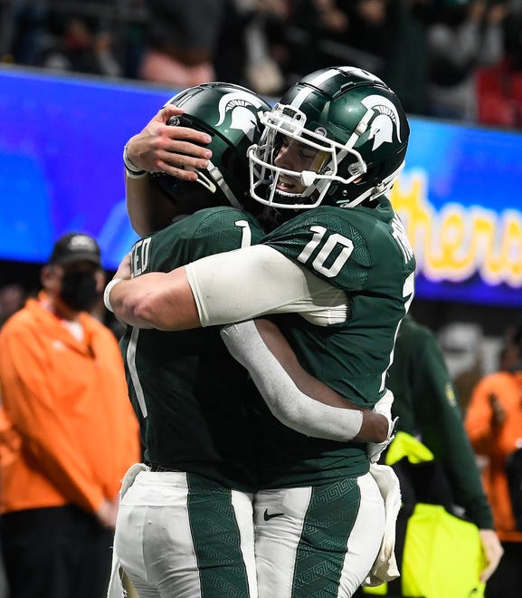 Michigan State wide receiver Jayden Reed and quarterback Payton Thorne celebrate Reed's touchdown in the fourth quarter.