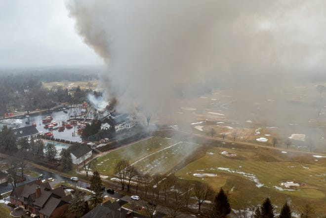 An aerial view of the clubhouse of the Oakland Hills Country Club in Bloomfield Hills as it burned 
on Thursday, Feb. 17, 2022.