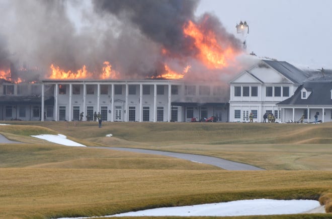 Oakland Hills Country Club burns on Thursday, Feb. 17, 2022.