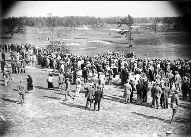 Fans follow players during the 1924 U.S. Open at Oakland Hills Country Club.