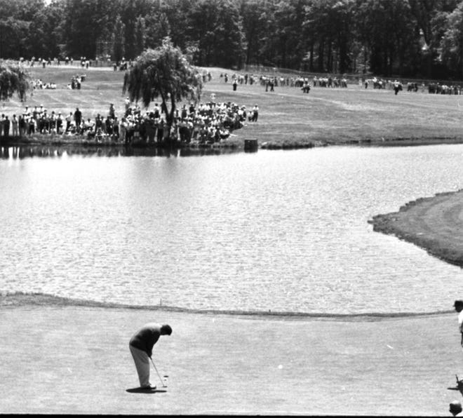 A player putts during the 1961 U.S. Open at Oakland Hills Country Club.